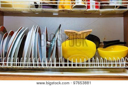 Dirty Grubby Drainer With Clean Dishes In Kitchen.
