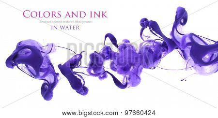Acrylic colors and ink in water. Abstract unfocused background.