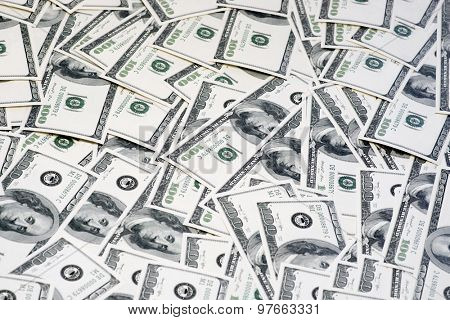 A pile of $100 hundred dollars US bank notes currency