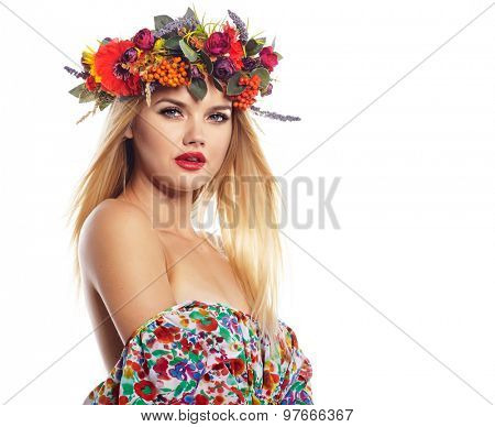 Slavic blonde girl in the flowers wreath