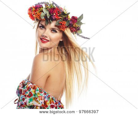 Slavic blonde girl in the flowers wreath