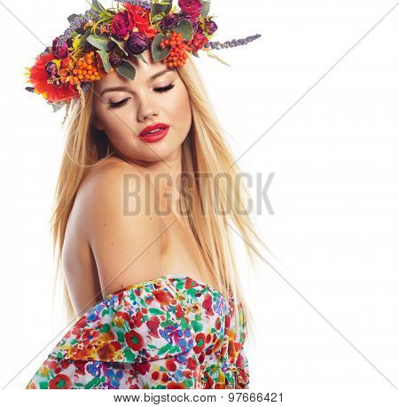 Slavic blonde girl in the flowers wreath