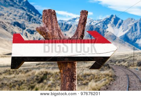 Yemen Flag wooden sign with desert road background