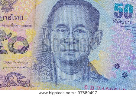 Close Up Of Thailand Currency, Thai Baht With The Images Of Thailand King. Denomination Of 50 Bahts.
