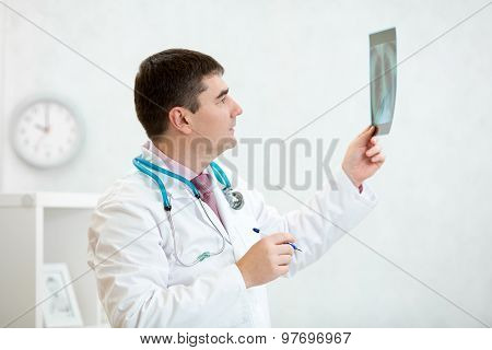 Doctor examining a lung radiography