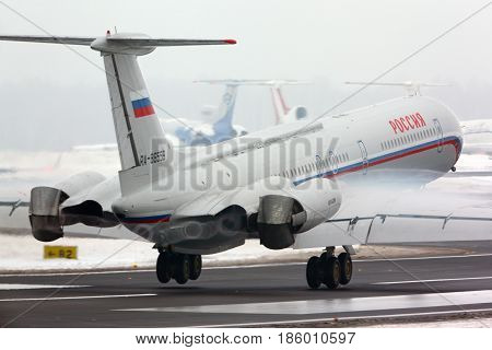 VNUKOVO, MOSCOW REGION, RUSSIA - FEBRUARY 11, 2013: Ilyushin IL-62M RA-86559 of Russian Air Force landing at Vnukovo international airport.