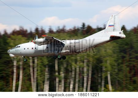 CHKALOVSKY, MOSCOW REGION, RUSSIA - AUGUST 26, 2011: Antonov An-12 RA-11344 of Russian Air Force landing at Chkalovsky.