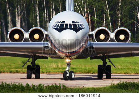 CHKALOVSKY, MOSCOW REGION, RUSSIA - JUNE 23, 2010: Ilyushin IL-62M RA-86496 of Russian Air Force taxiing at Chkalovsky.