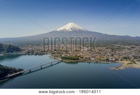Mountain Fuji reflected in Kawaguchiko lake on a sunny day and clear sky, Yamanashi Japan