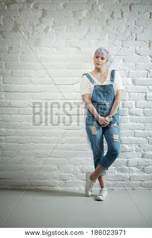 Young woman in studio in retro style.