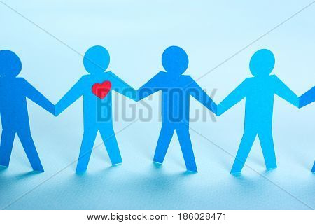 Search for true love or your second half. A dating site a blind date. Like-minded. Paper men holding hands.