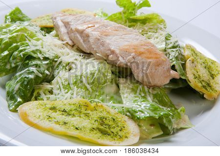 Caesar Salad Plate With Cheese And Garlic Bread