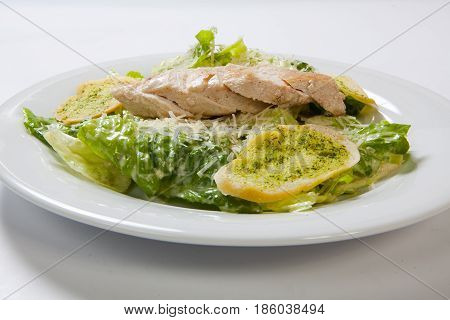 Caesar Salad Plate With Cheese And Garlic Bread