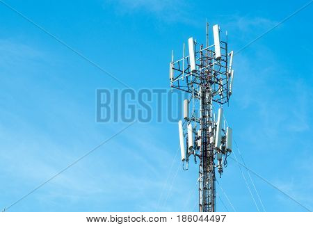Communication cell phone and background concept - Cell phone antenna with blue sky and could with copyspace