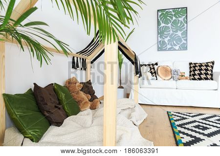 Botanical calm bright kids interior with tropical prints