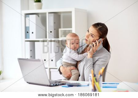 business, motherhood, multi-tasking, family and people concept - businesswoman with baby calling on smartphone at office