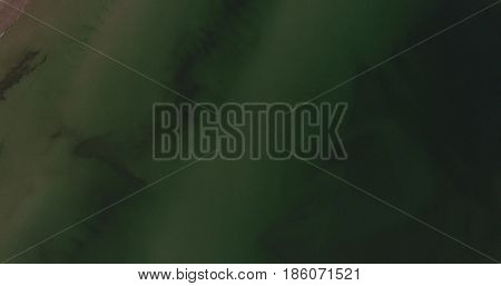 Aerial view of Baltic sea shore, waves and sandy beach. Lubiatowo, Poland