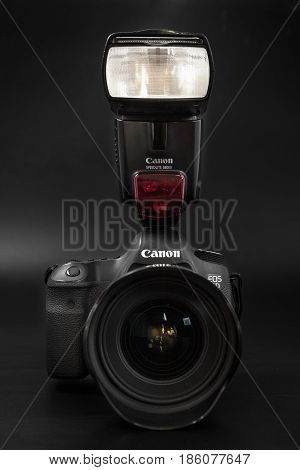 GOMEL BELARUS - May 12 2017: Canon 6d camera with lens on a black background. Canon is the world's largest SLR camera manufacturer