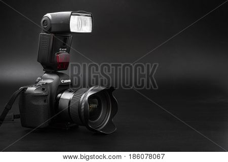 GOMEL BELARUS - May 12 2017: Canon 6d camera with lens on a black background. Canon is the world's largest SLR camera manufacturer