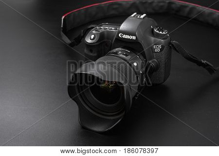 GOMEL BELARUS - May 12 2017: Canon 6d camera with lens on a black background. Canon is the world's largest SLR camera manufacturer