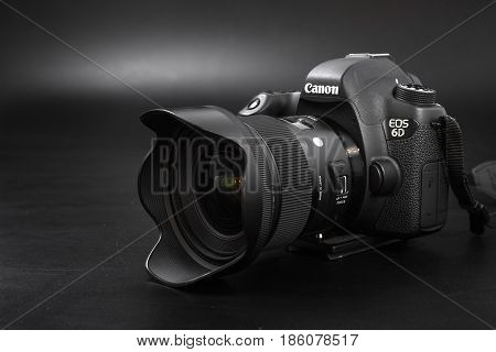 GOMEL BELARUS - May 12 2017: Canon 6d camera with lens on a black background. Canon is the world's largest SLR camera manufacturer