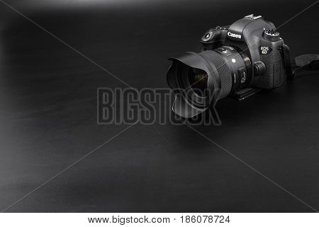 GOMEL BELARUS - May 12 2017: Canon 6d camera with lens on a black background. Canon is the world's largest SLR camera manufacturer