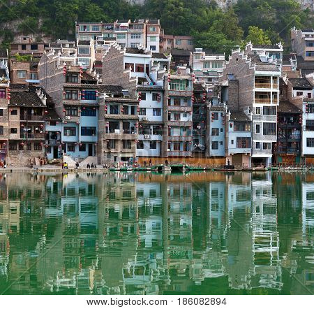 Panorama of Zhenyuan Ancient Town on Wuyang river in Guizhou Province, China. It is under the administration of the Qiandongnan Miao and Dong Autonomous Prefecture