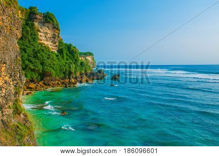 View Of The Cliffs And The Sea In Bali. Indonesia. Uluwatu, Pantai Suluban.