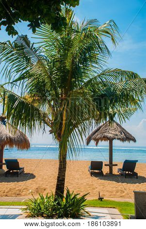 Sun Loungers And Parasols On The Beach. Bali, Indonesia, Tanjung Benoa. Nusa Dua.