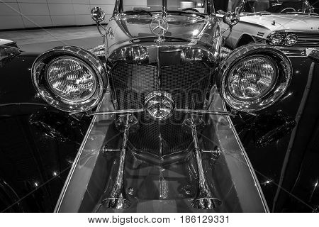 STUTTGART GERMANY - MARCH 02 2017: Detail of the luxury car Mercedes-Benz 500 Cabrio Replica 1934. Black and white. Europe's greatest classic car exhibition "RETRO CLASSICS"