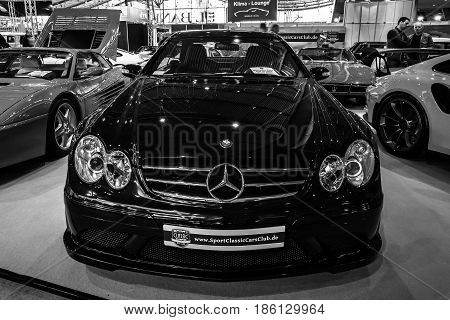 STUTTGART GERMANY - MARCH 02 2017: Mid-size luxury sports car Mercedes-Benz CLK63 AMG Black Series 2007. Black and white. Europe's greatest classic car exhibition 