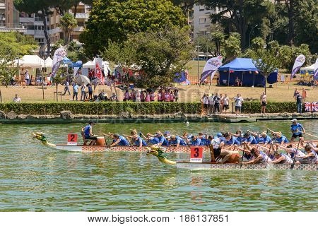 Rome Italy - July 30 2016: Dragon boat crews compete at the european championships held in Italy in 2016 summer in the photo the Italian and the UK crew