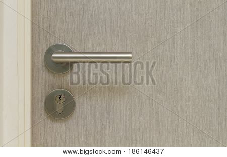 Closed gred door with metal door knob