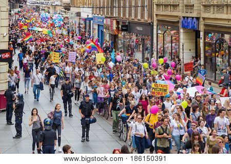 ZAGREB, CROATIA - JUNE 11, 2016: 15th Zagreb pride. LGBTIQ activists on Illica street heading to main square.