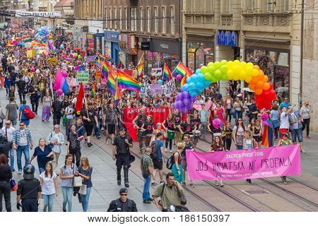 ZAGREB, CROATIA - JUNE 11, 2016: 15th Zagreb pride. LGBTIQ activists on Illica street heading to main square.