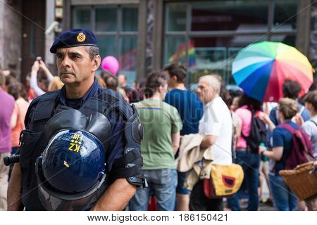 ZAGREB, CROATIA - JUNE 11, 2016: 15th Zagreb pride. Intervention policeman in front of LGBTIQ activists on Ban Josip Jelacic square.