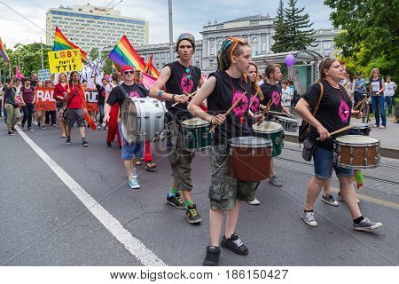 ZAGREB, CROATIA - JUNE 11, 2016: 15th Zagreb pride. LGBTIQ activists playing drums.