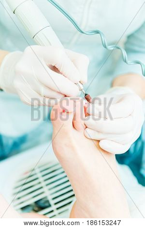 People at work. Photo of pedicure procedure in process