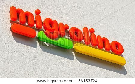 Einsiedeln, Switzerland - 7 September, 2015: sign on the wall of a migrolino store. migrolino AG company operates a large network of convenience stores in Switzerland, it is a fully owned subsidiary of Migros - Switzerland's largest retail company.
