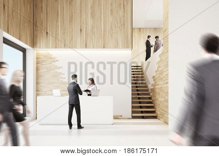 Front view of an office lobby with business people a white reception counter and stairs. 3d rendering