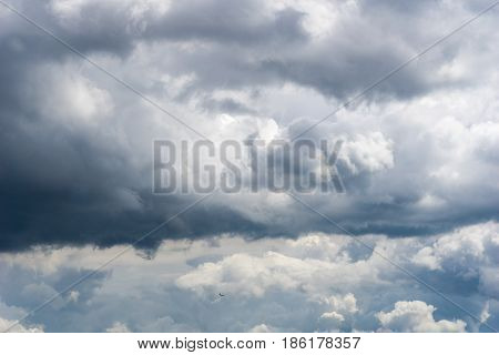 View on an Airplane in a Storm. Grey and dark clouds. Thunder Storm, Cloudy Day, Bad Weather, Fresh Air. Cloud Formations.