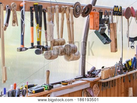 Home workshop full of wooden tools  .