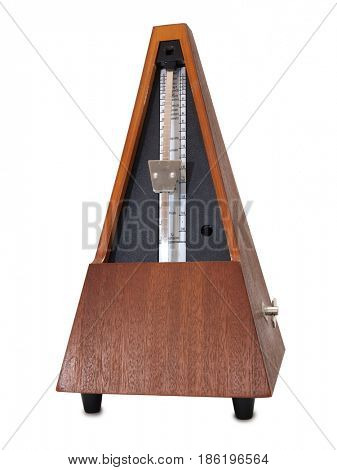 Old mechanical metronome on a white background         