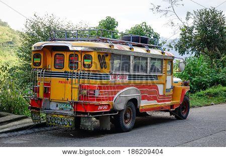 Vehicles On Street In Banaue, Philippines