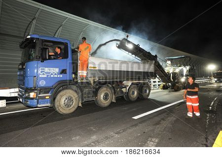 Workers And Vehicles During The Road Milling Of The Highway