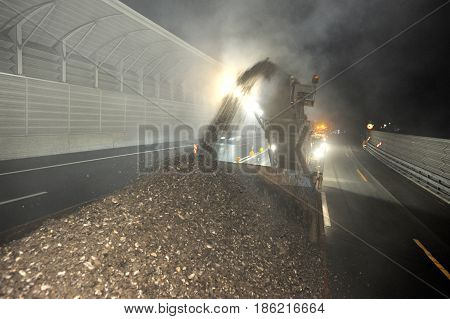 Workers And Vehicles During The Road Milling Of The Highway