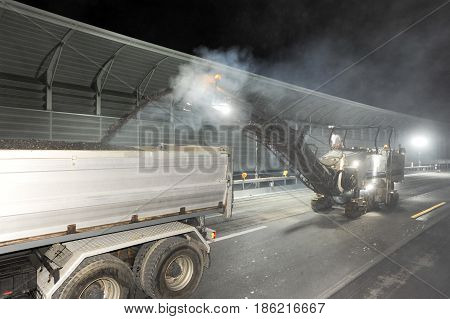 Workers And Vehicles During The Road Milling Of The Highway