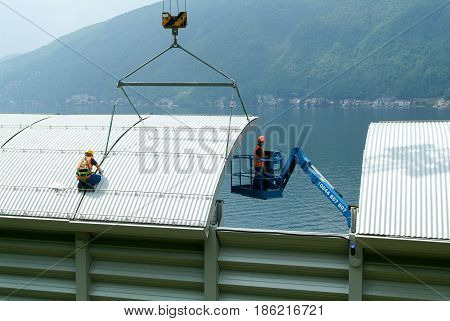 Workers During The Installation Of Noise Barriers On The Highway