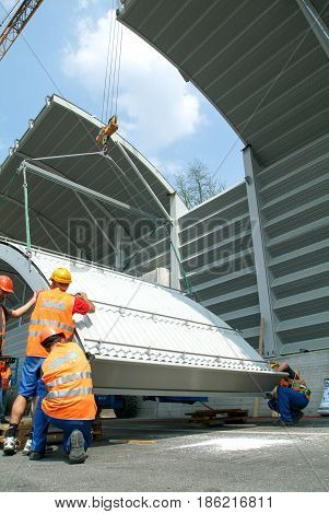 Workers During The Installation Of Noise Barriers On The Highway