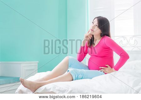 beauty pregnancy woman feel upset on the bed